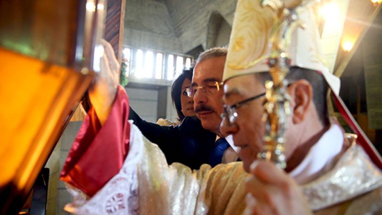 Presidente Danilo Medina junto a la primera dama Cándida Montilla de Medina durante la misa