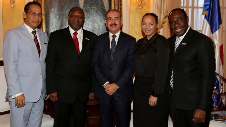 Danilo Medina y miembros de ACT Alliance