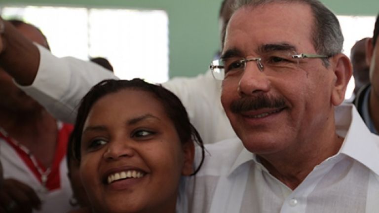 Danilo Medina y mujer de San Juan